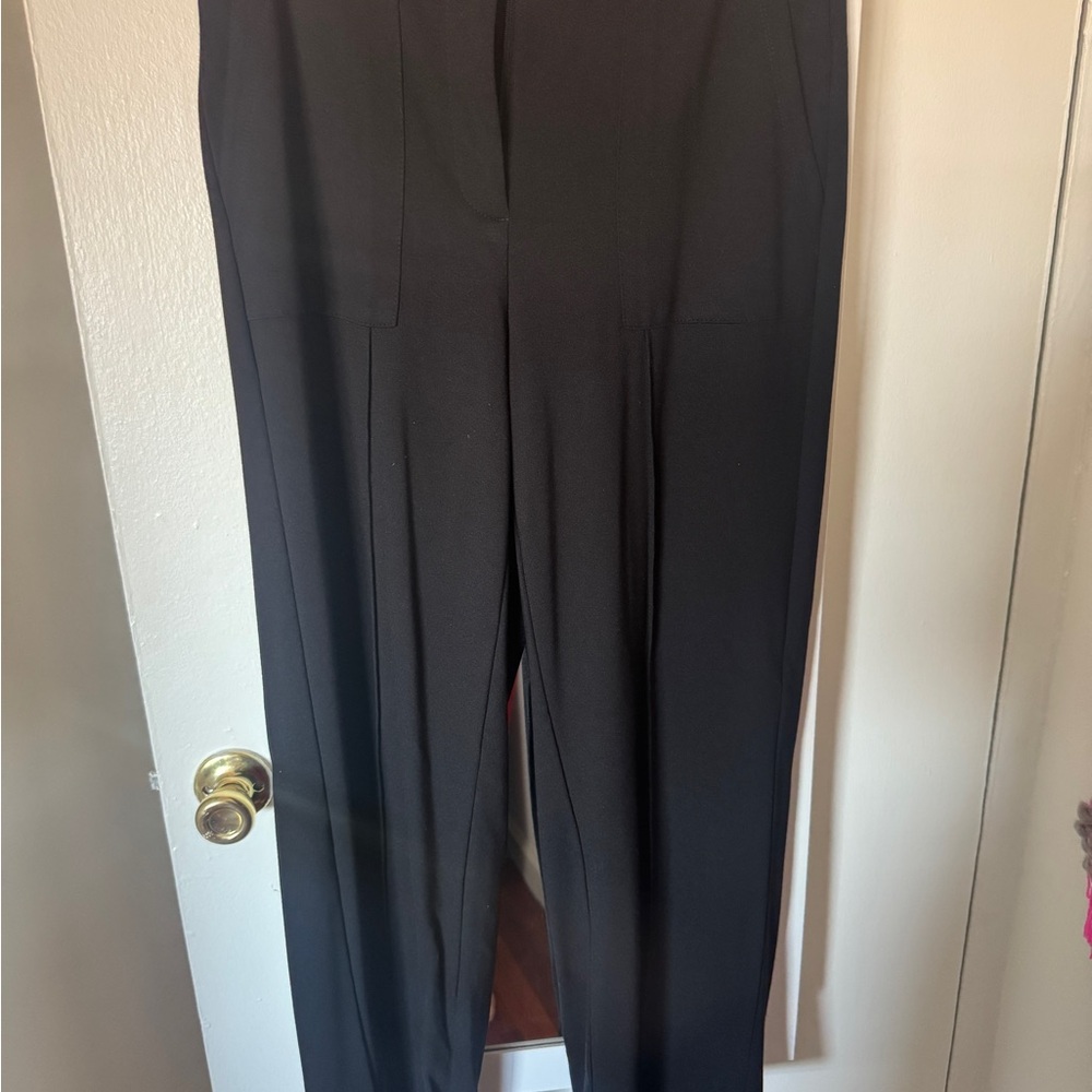 Tahari wide leg black dress pants with cargo style pockets. Size 10.